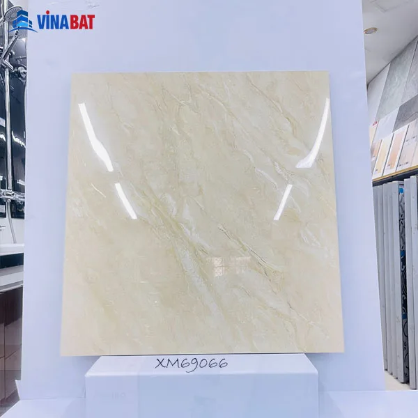 Gạch lát ốp lát Catalan Xsmart 60x60cm XM69066 vân đá vàng bóng 1 gach-op-lat-60x60-XM69066